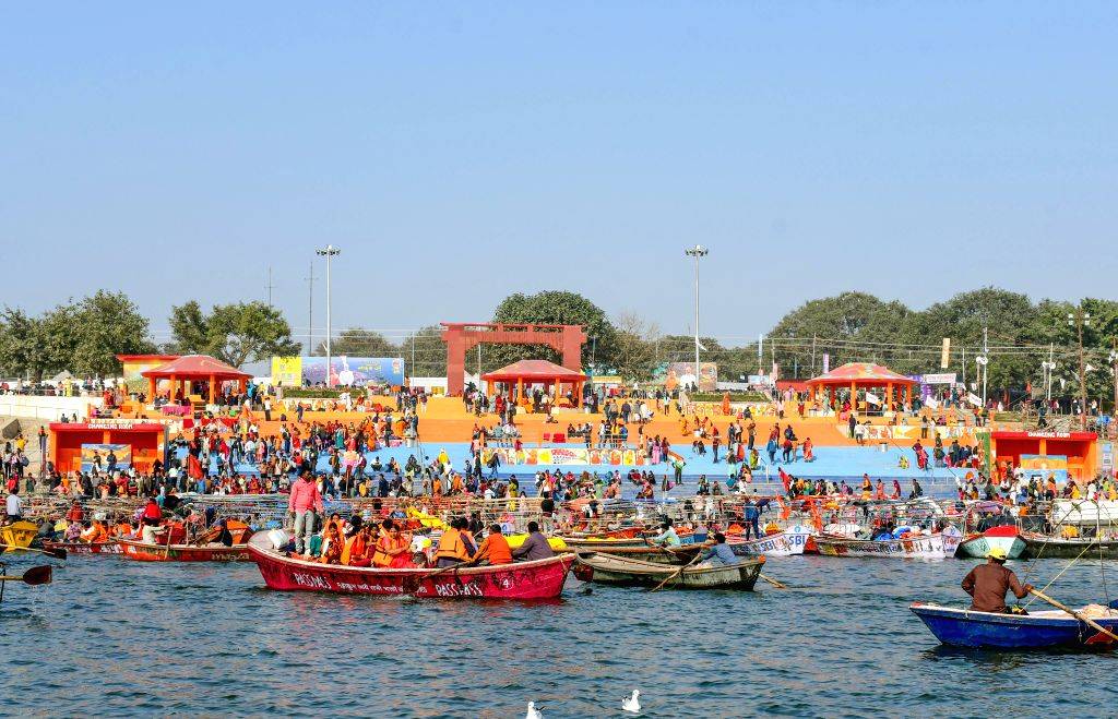 devotees take a boat ride at the triveni sangam 1832320